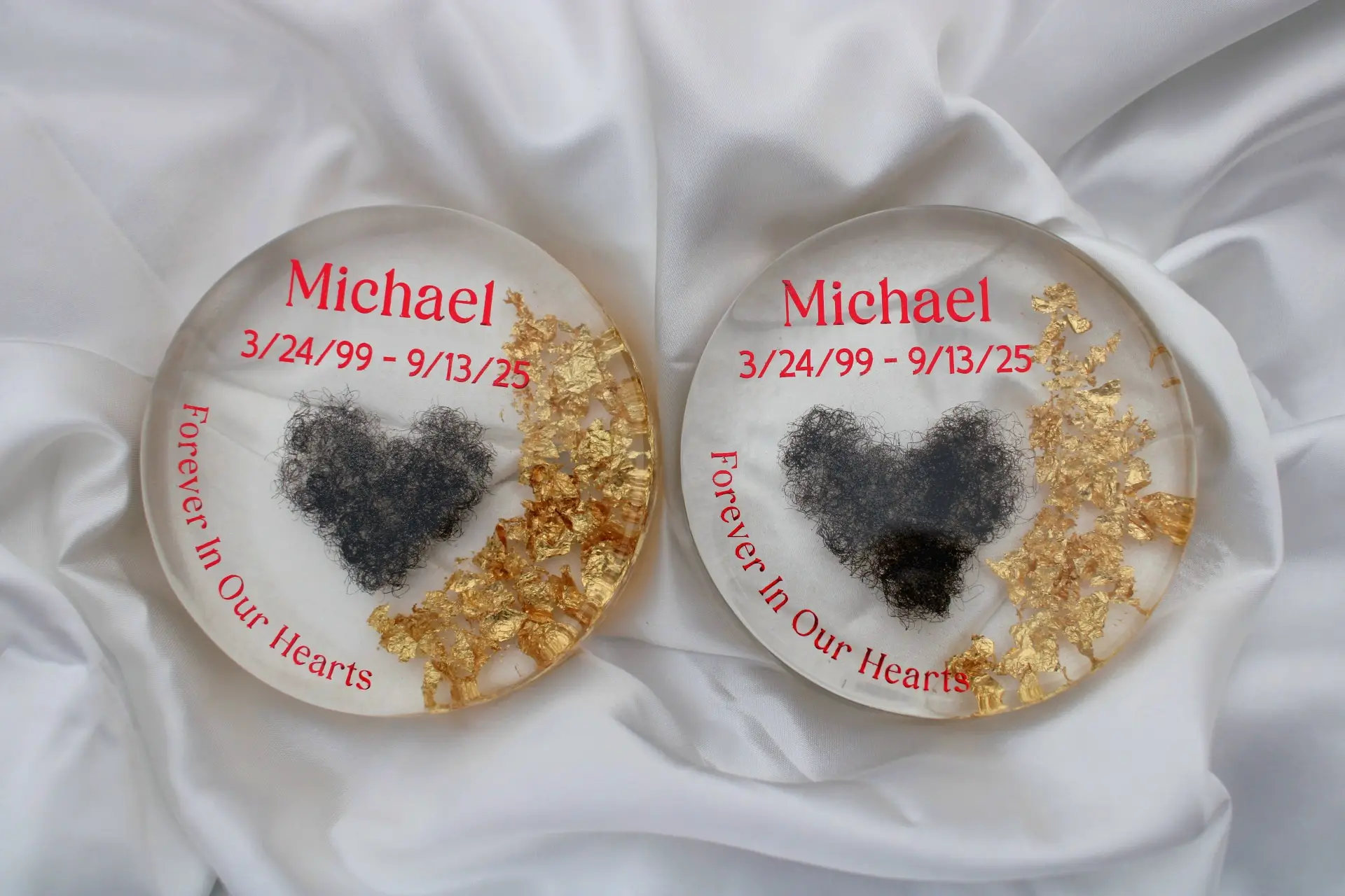 Resin coasters preserving hair as a memorial keepsake.